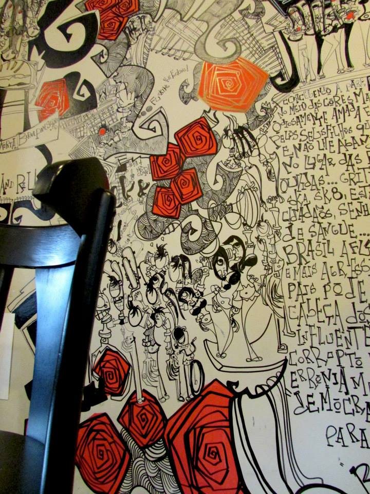 Obra sobre papel em vermelho, preto e cinza / arquivo do artista